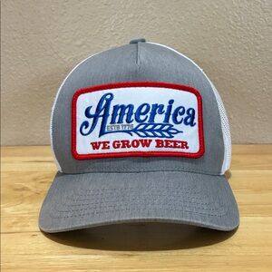 Gray & White Trucker Hat with “America estd 1776  We Grow Beer” Patch. Snapback